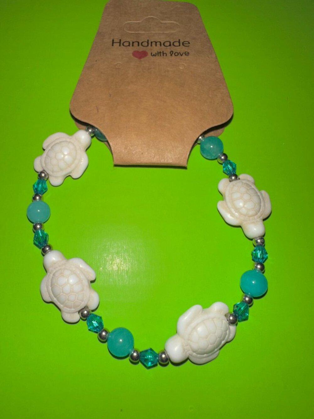 Beautifully handcrafted in Hawaii - Hono- Sea Turtle bracelet w/ aqua crystals